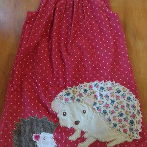 Cute red hedgehog pinafore dress